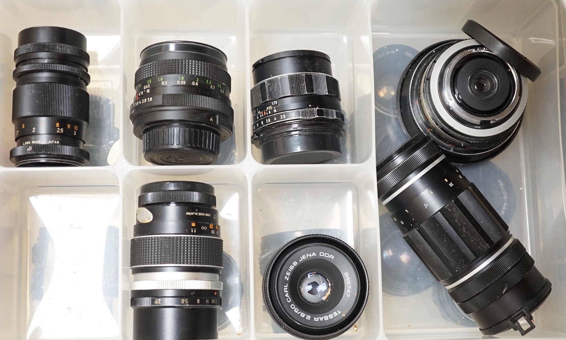 A large collection of SLR camera bodies and lenses, including Pentax, Tamron, etc. and other photographic equipment including a boxed Ensign Episcope, a case of various filters etc.